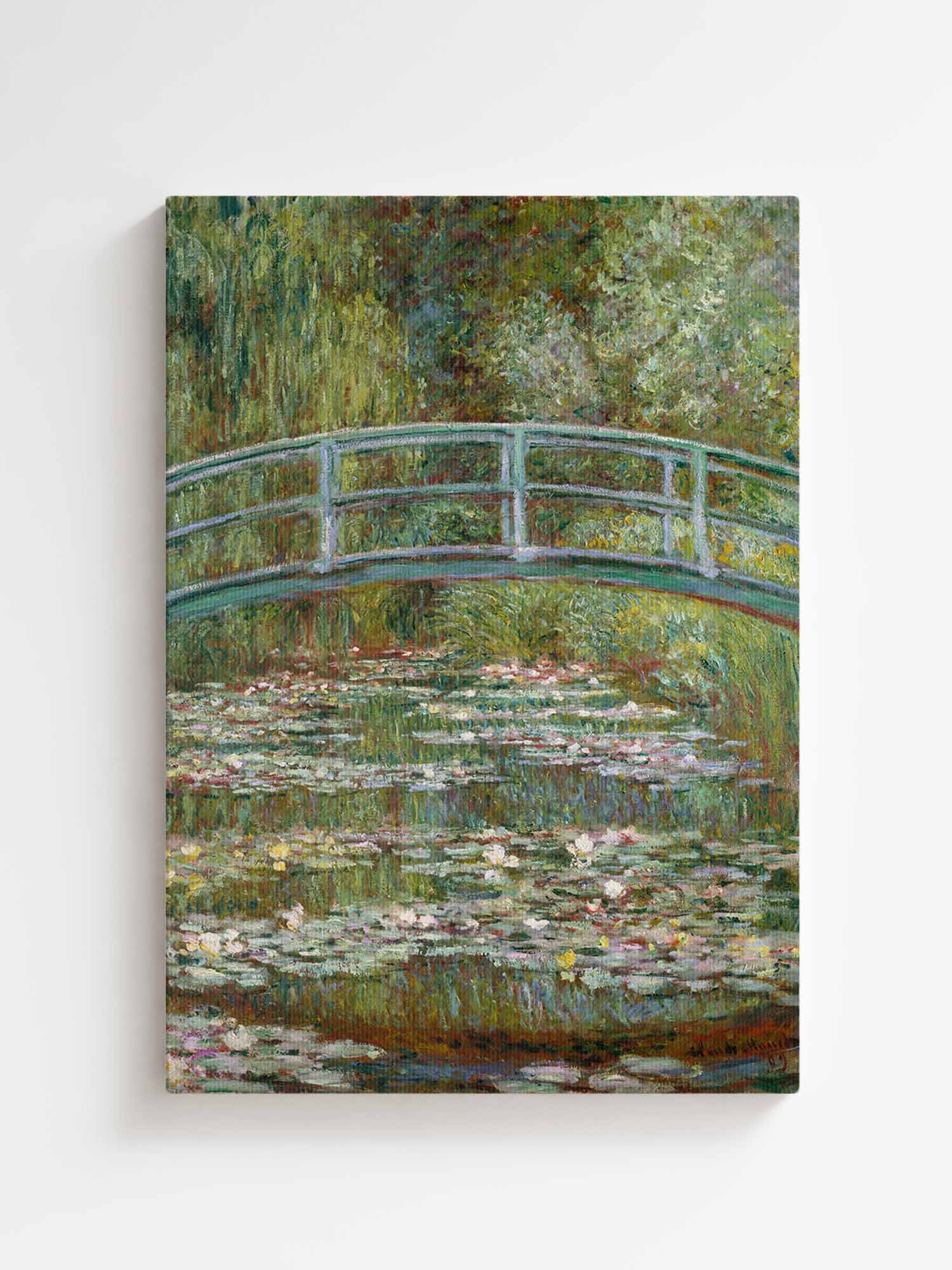 Claude Monet Japanese Bridge canvas wall art – large Impressionist water lilies print from Atora Gallery. Calm, elegant decor for a serene, stylish home.