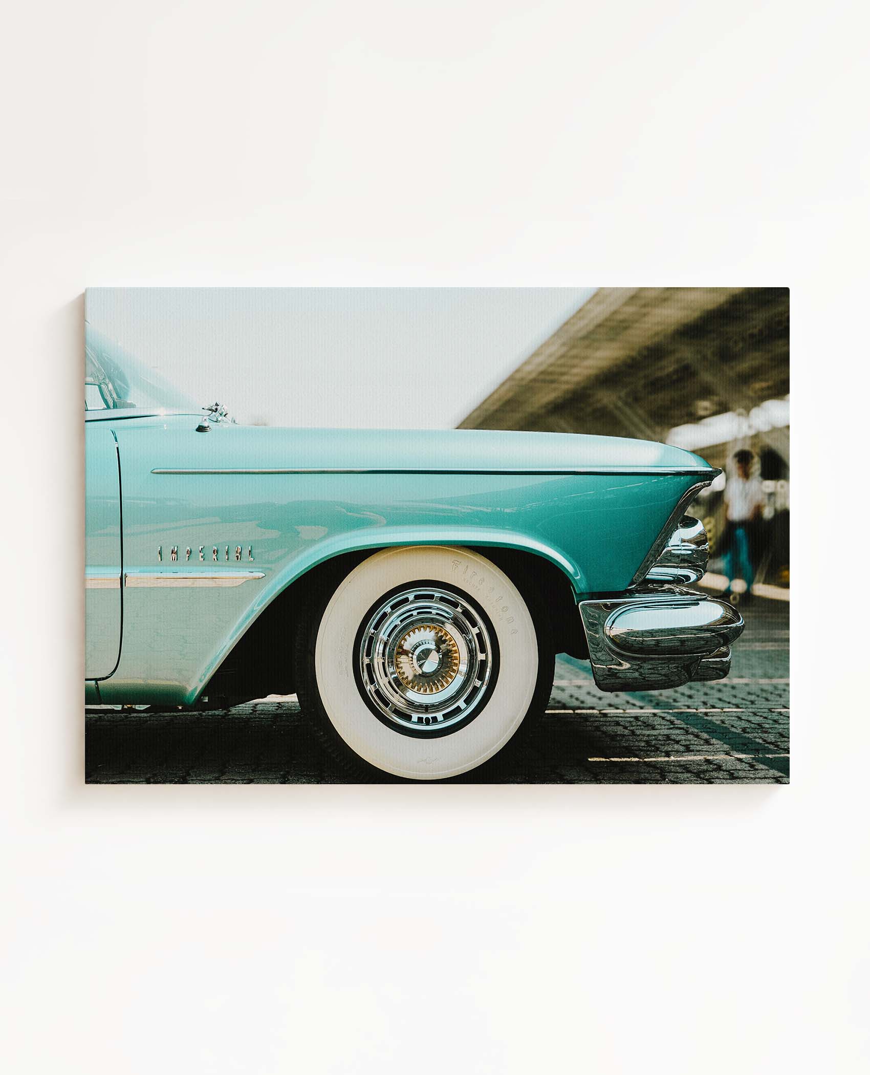 Horizontal canvas wall art featuring a vintage blue classic American car with chrome details and whitewall tires. Printed on high quality canvas